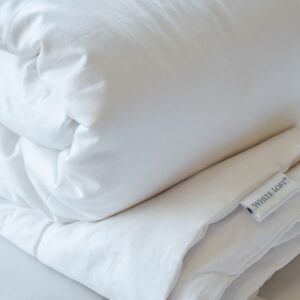 Silk Filled Comforter_Rolled-Close up_White Loft_1080x1080