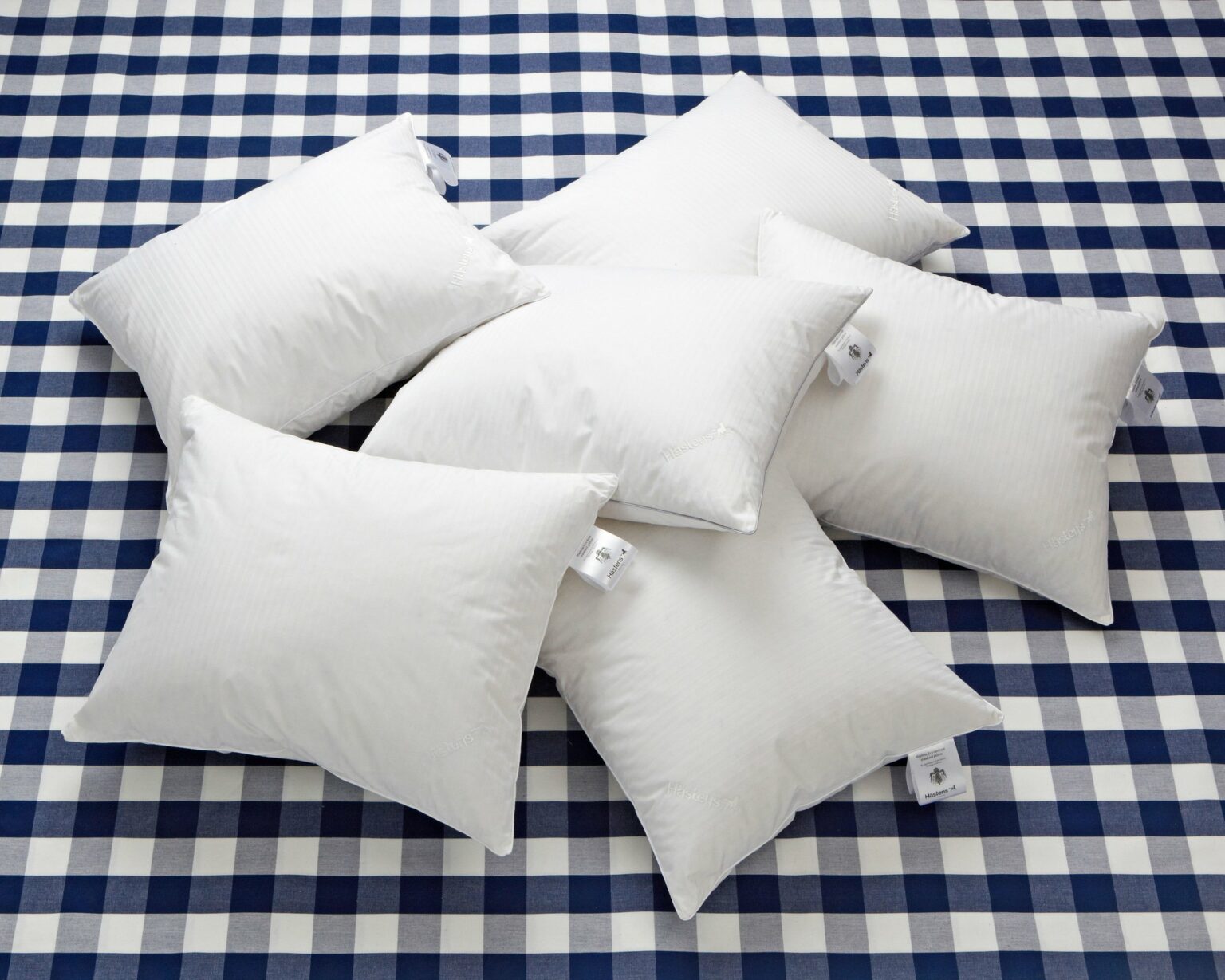 firm-pillow-high-scattered-on-original-blue-check-print_hastens