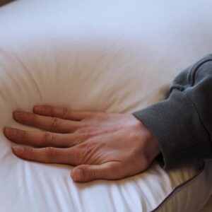 Down Pillow_Compressed_Model hand_45th St Bedding