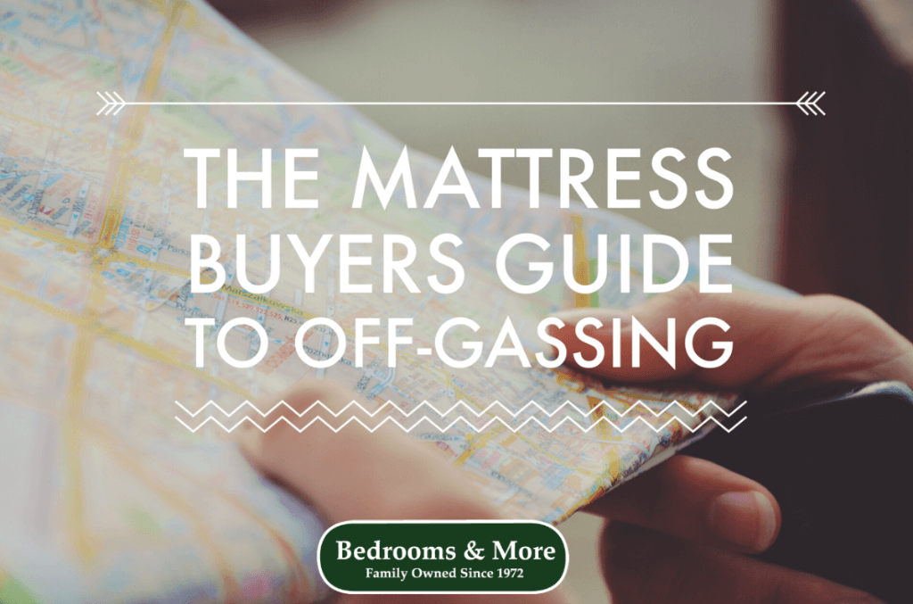photo of hands holding map with text overlay, "The Mattress Buyers Guide to Off-Gassing"